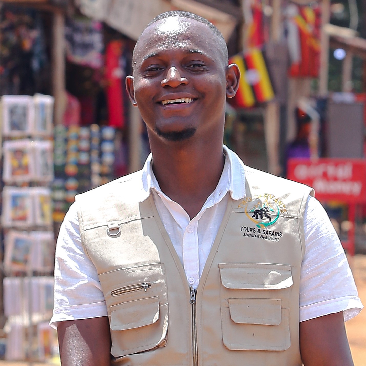 Bukenya Douglas Collins, Tour Leader at Two Servants Tours and Safaris, in Kayabwe, Uganda home to the at the Equator Monument.
