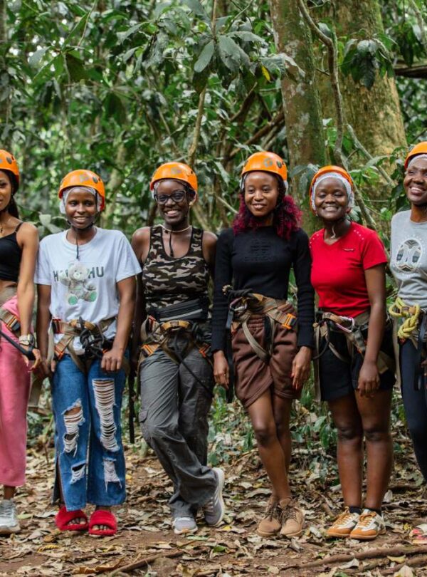 Two Servants group in helmets and harnesses ready for an adventure day in Mabira Forest